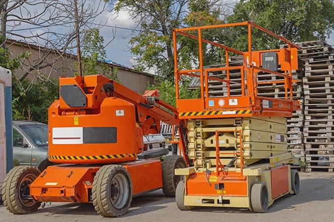 forklift transporting boxes in a busy warehouse in Eagle Point, OR